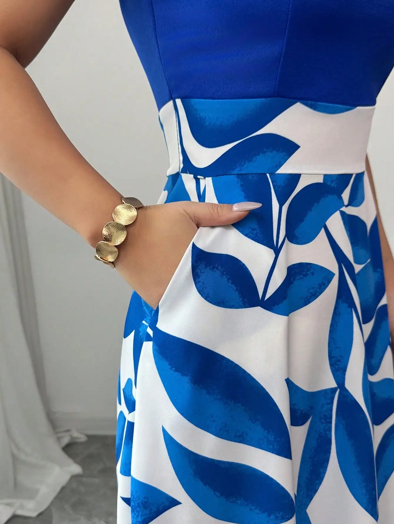 Women's Blue White Floral Maxi Dress Asymmetric Neckline Color Block Design Ideal for Evening Events Garden Parties Elegant Styl