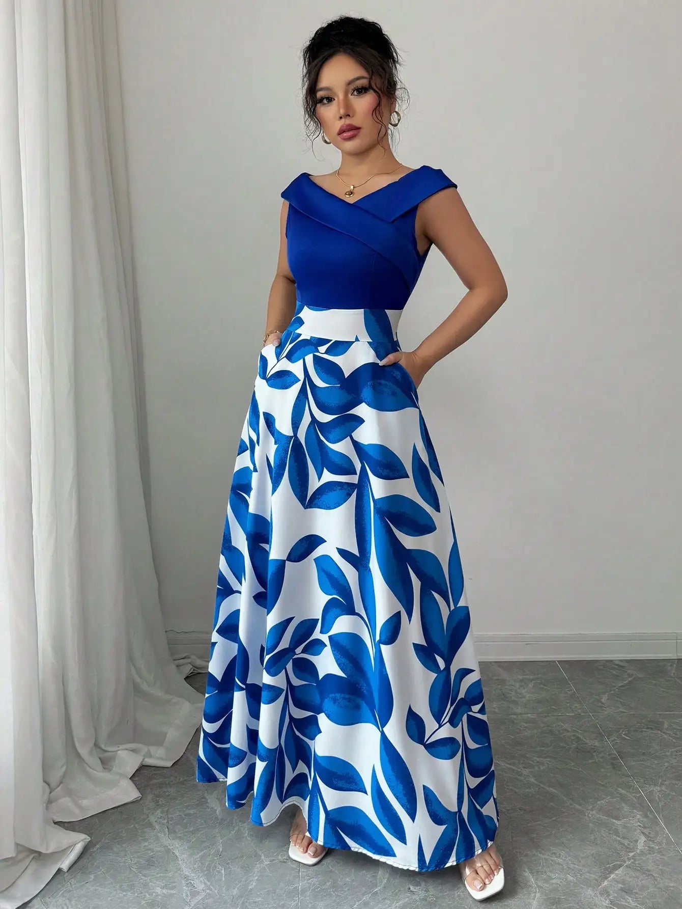 Women's Blue White Floral Maxi Dress Asymmetric Neckline Color Block Design Ideal for Evening Events Garden Parties Elegant Styl