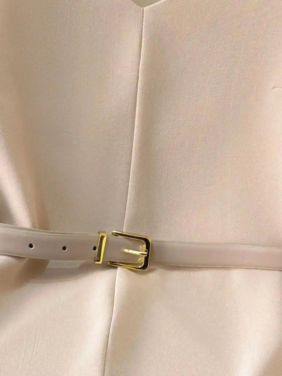 Women's Light Beige Lotus leaf sleeves Top with Deep V-Neck and Shoulder Ruffles Paired with a Light Gray Belt and Gold Buckle